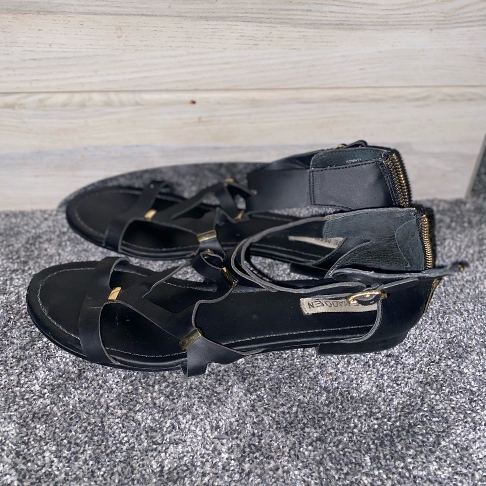 Black and gold Steve Madden women’s sandal